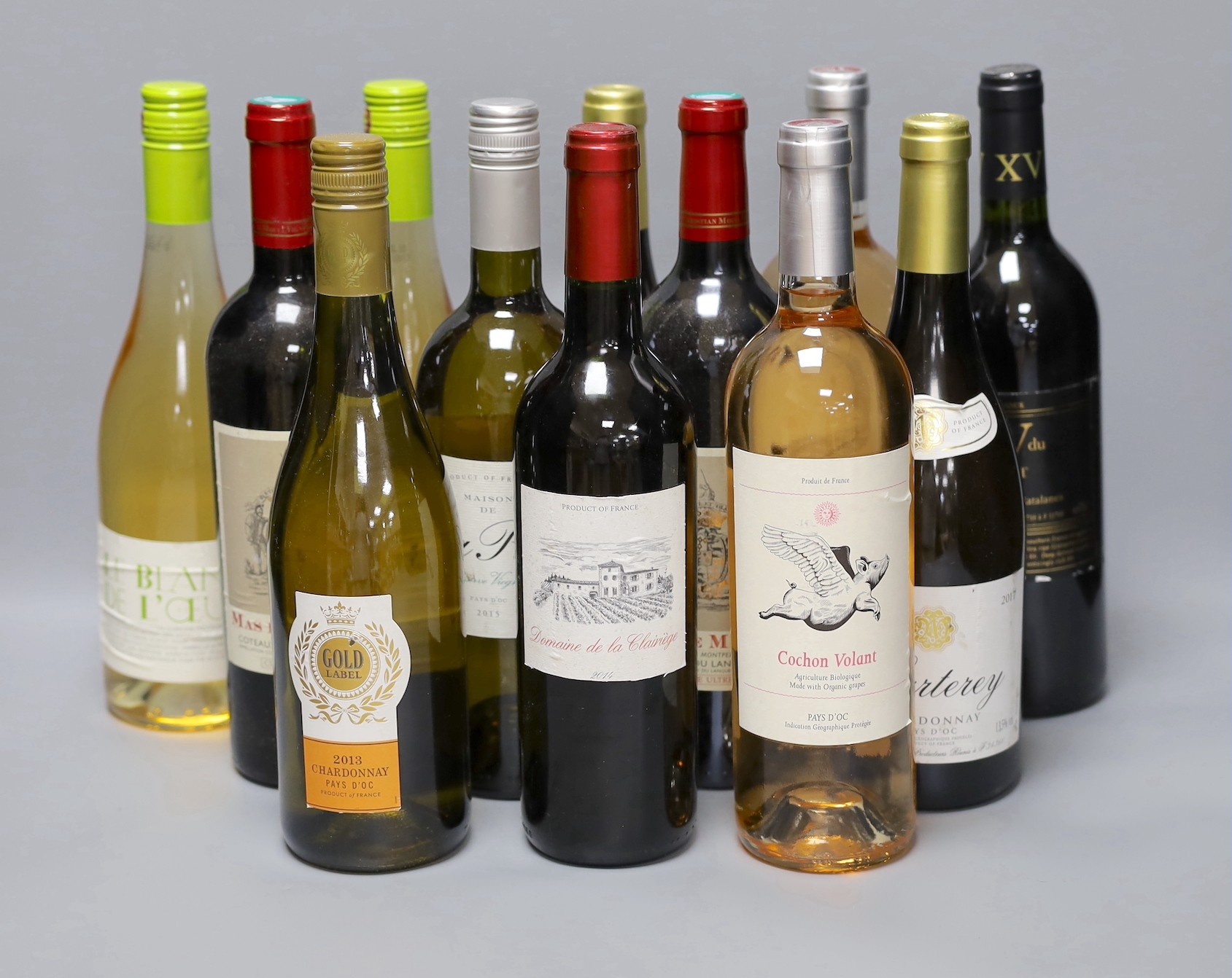 Twelve various bottles of wine including Marterey Chardonnay, Cochon Volont, Mas D Martin etc.